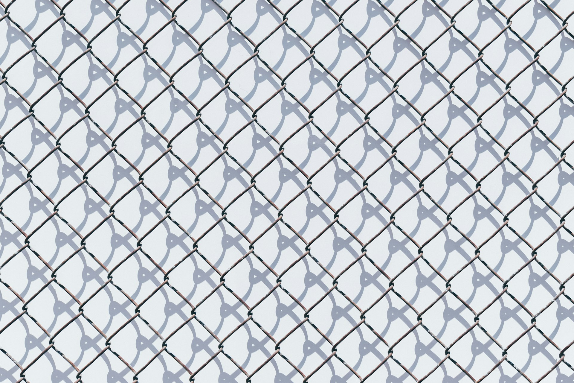 black and white metal chain link fence
